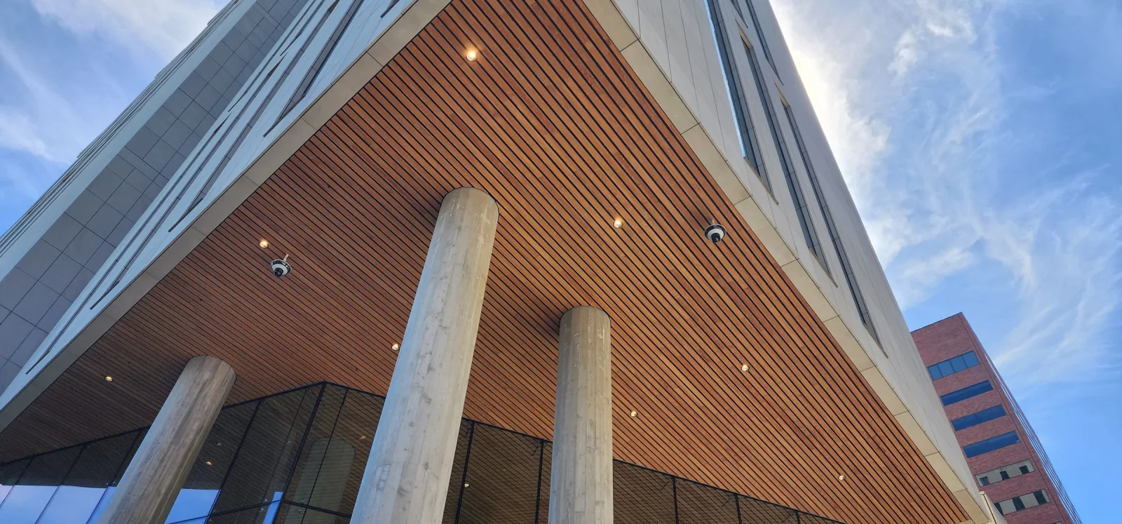 Wood soffit of the courthouse entrance canopy and concrete columns